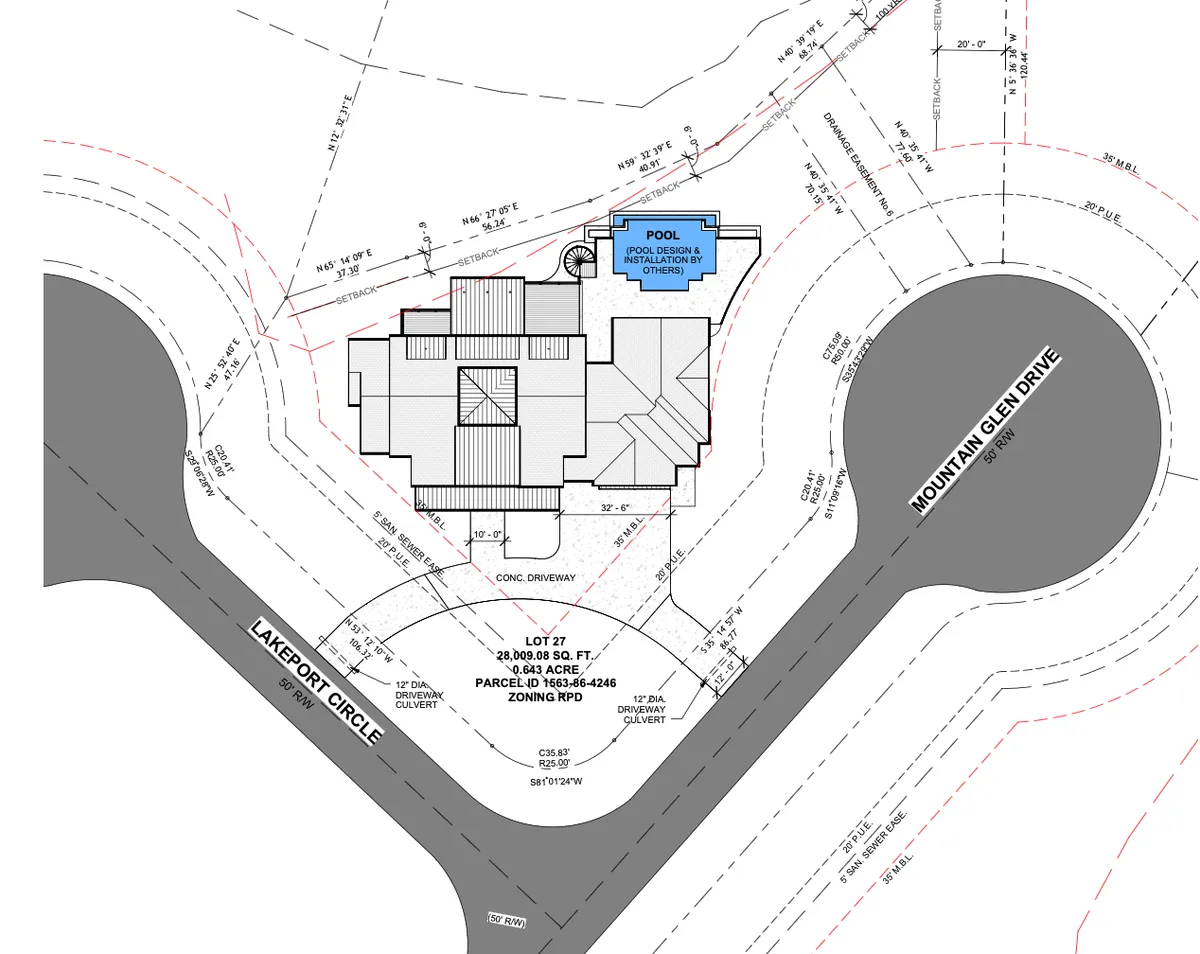 Site plan showing the house, pool, and curved driveway between two roads